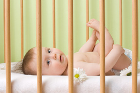 a baby in a crib on the day care injuries page for Heintz & Becker, a law firm with offices in Sarsota and Bradenton, Florida